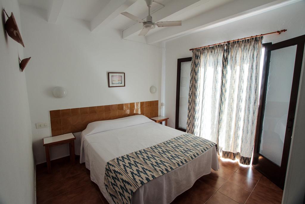 Apartamentos Sa Cala Cala Morell Esterno foto